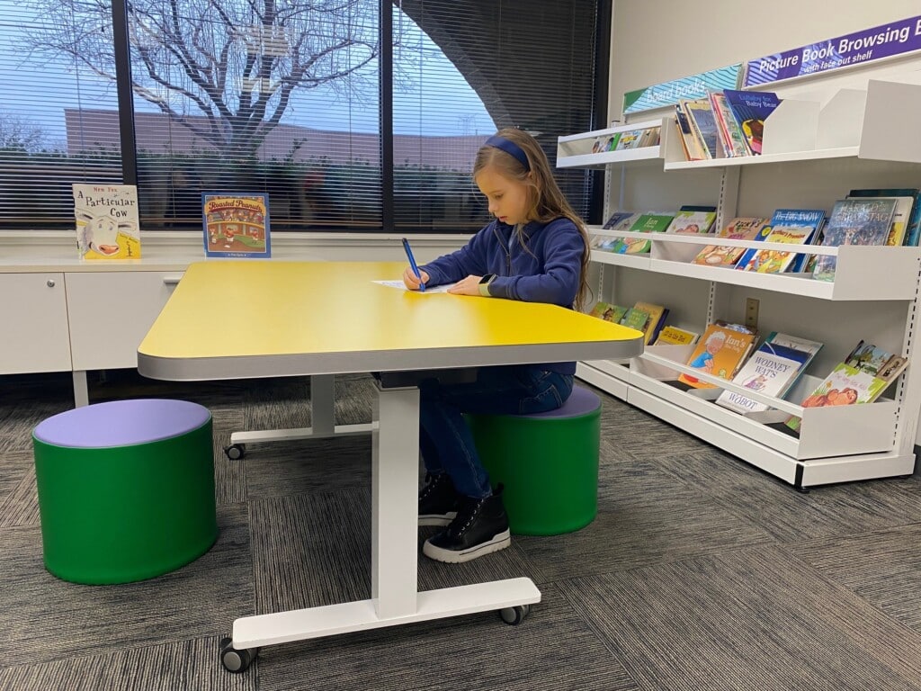 girl sitting maker flex kids (lowest at 24in)