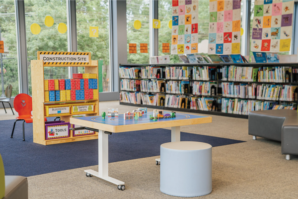 Height-adjustable activity table for library spaces